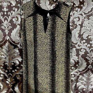 Women dress black with gold shimmer